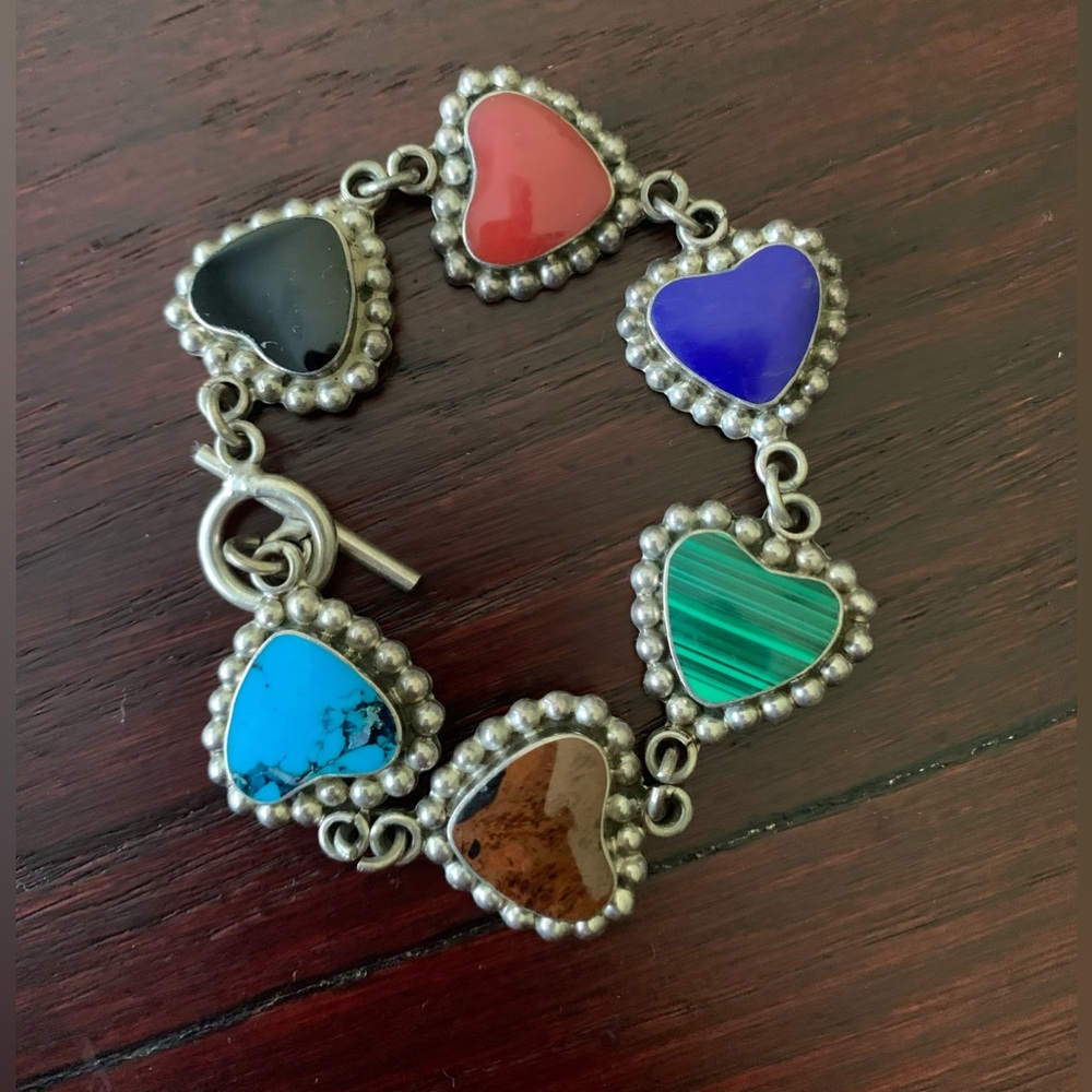 Sterling Silver heart bracelet (scar on style)